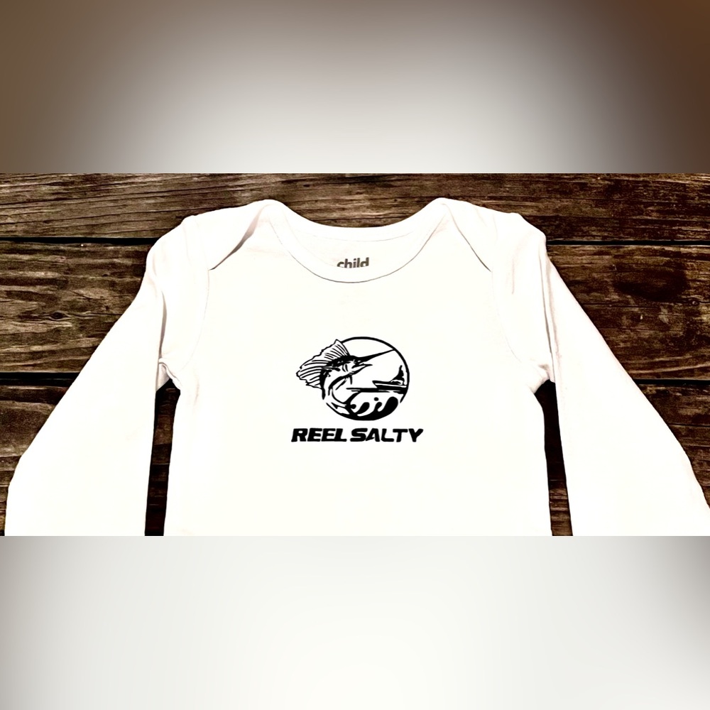 New White long sleeve onsie, vinyl was cut and heat pressed by me. Size 9months